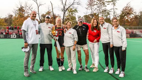 Bibi Donraadt with her family and coaches on Senior Day