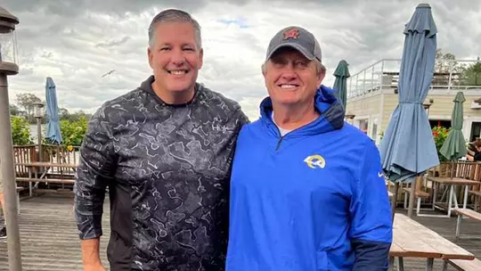 Mitch Suplee with his college offensive line coach John Zernhelt