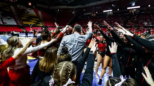 Gymnastics team huddle