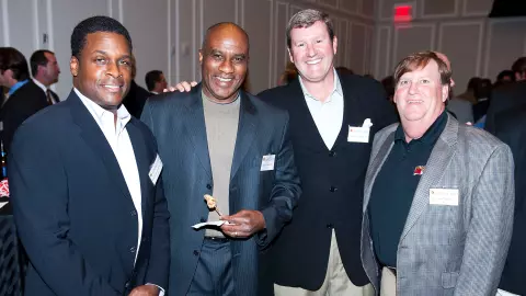 Curtis Roundtree with fellow alums