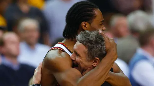 Chris Wilcox and Gary Williams celebrate winning the 2002 NCAA title