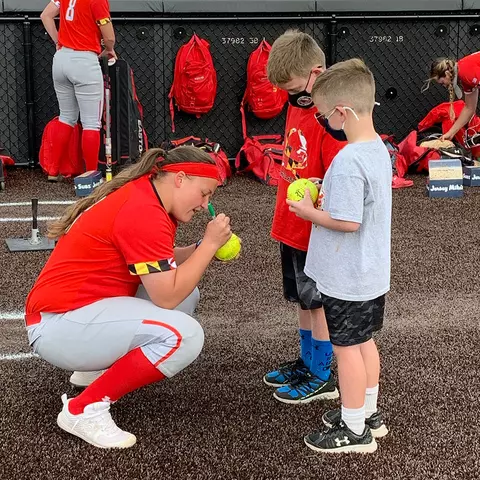 Taylor Liguori signing autographs