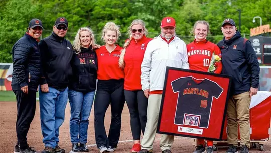 Katie Dustin with family on Senior Day