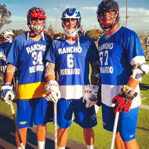 Will Yeatman with his brothers at high school alumni lacrosse game