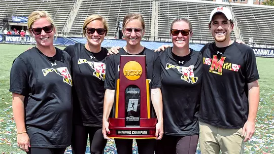 Caitlyn Phipps with 2019 Coaching Staff & NCAA Championship