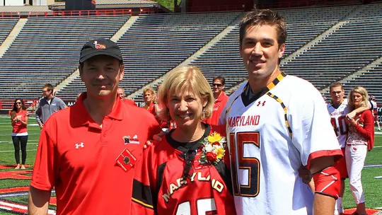 Mike Scheeler with his parents on Senior Day
