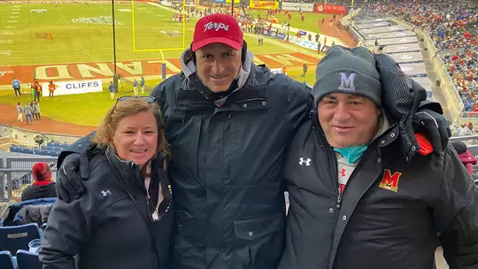 Angie Perry, Danny Frank, and Ronnie Ohringer at the 2021 Pinstripe Bowl