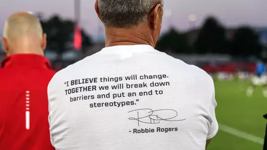 Robbie Rogers quote on the back of Maryland men's soccer Pride Night warm-up shirts