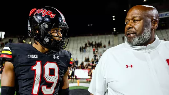 Donnell Brown and Coach Locksley