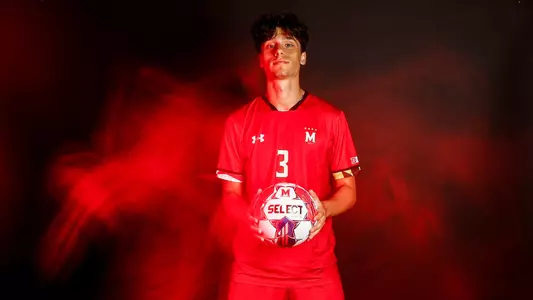 Luca Costabile Posed Photo Holding a Soccer Ball