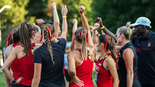 Cross Country Team Huddle at Goucher Invite