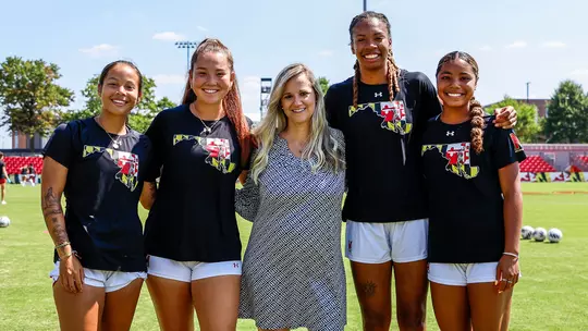 Lindsay Simpson with Women's Soccer Student-Athletes
