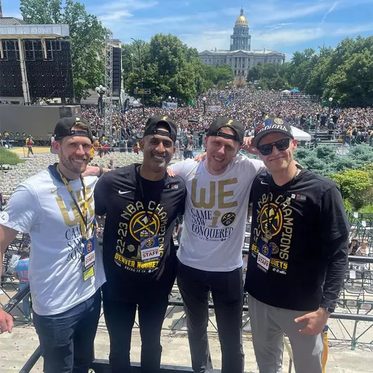 Drew Nicholas with members of the Denver Nuggets organization at the 2023 NBA Championship celebration