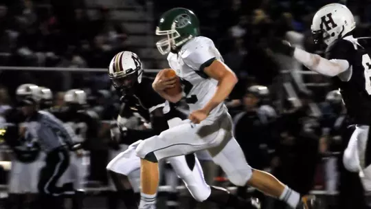 Brian McMahon playing football in high school