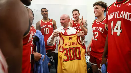 Coach Willard Celebrates 300th Win with Team in Locker Room