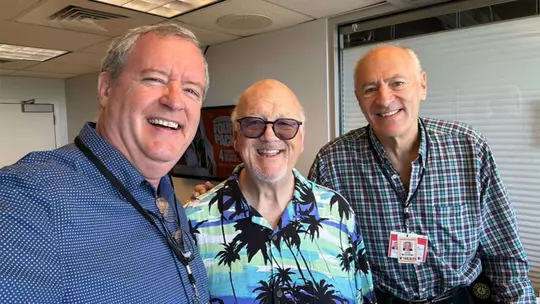 Matt Hicks with Hall of Fame broadcaster John Miller and his Rangers partner Eric Nadel