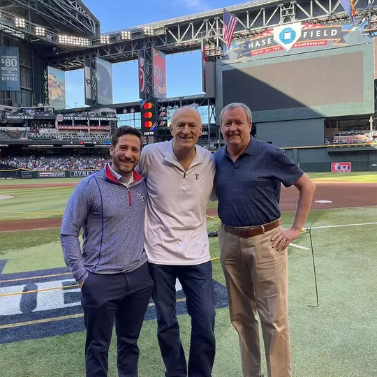 Matt Hicks and the Rangers' radio crew before Game 5 of the 2023 World Series at Arizona's Chase Field