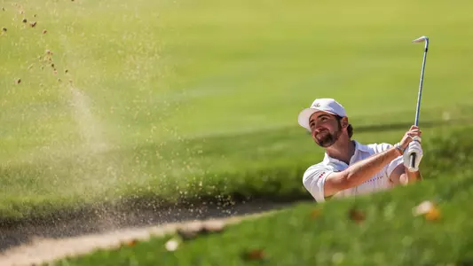 Dillon Brown swings out of the bunker at TPC Potomac