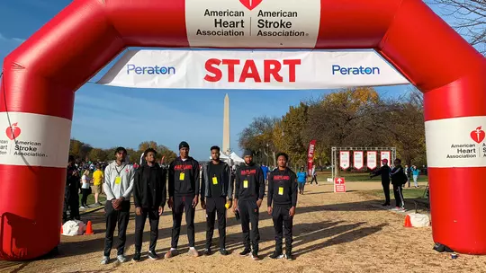 Men's Basketball student-athletes volunteering at American Heart Association Walk