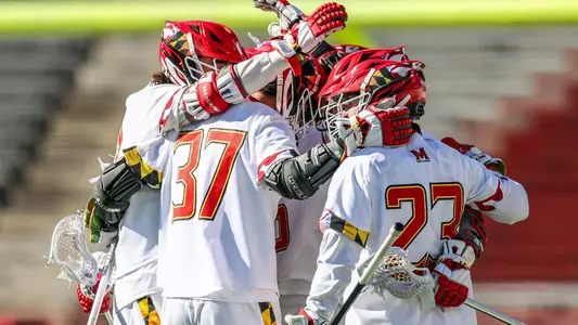 Men's Lacrosse players celebrate a goal vs. Richmond