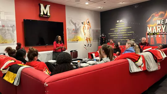 Brie Jackson talks with Maryland women's basketball team