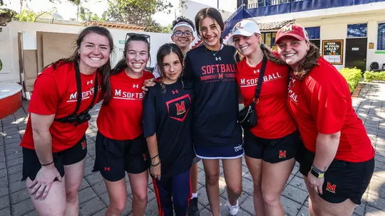 Taylor Liguori and Maryland softball players at a clinic during their Mexico trip in 2023