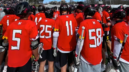 Men's Lacrosse team huddle at Albany