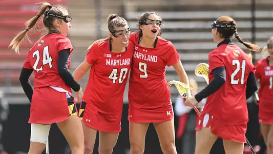 Libby May & Hannah Leubecker celebrate goal at Rutgers