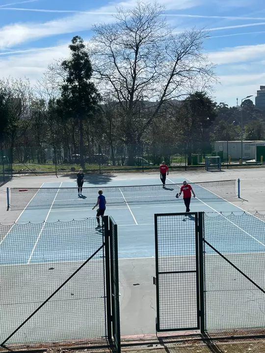 Men's Soccer Group Playing Pickeball in Portugal