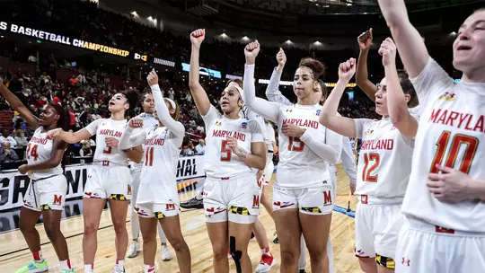 Maryland women's basketball players on the court following the 2023 Sweet 16 win over Notre Dame