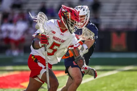 Midfielder Dante Trader Jr. (5) Maryland Men's Lacrosse vs. Syracuse at SECU Stadium in College Park, MD on Saturday, Feb. 18, 2023. Audrey Keefe/Maryland Terrapins