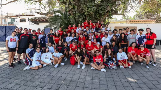 Maryland softball at a youth clinic in Mexico