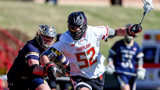 Luke Wierman winning a faceoff vs. Notre Dame