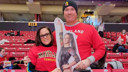 Liz and Patrick Brozowski with a cutout of Tasha
