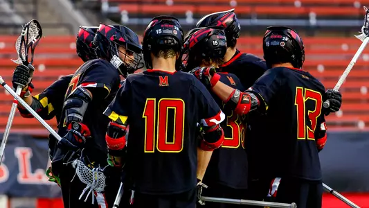 Maryland men's lacrosse team huddle at Rutgers in 2023