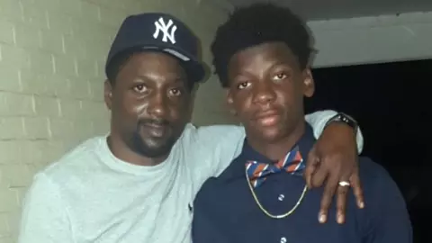 Deonte Banks with his father