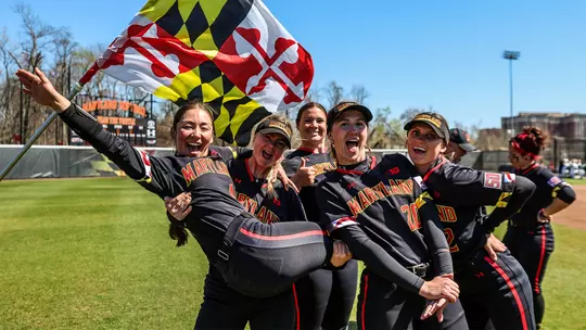 Maryland softball student-athletes celebrating after a victory