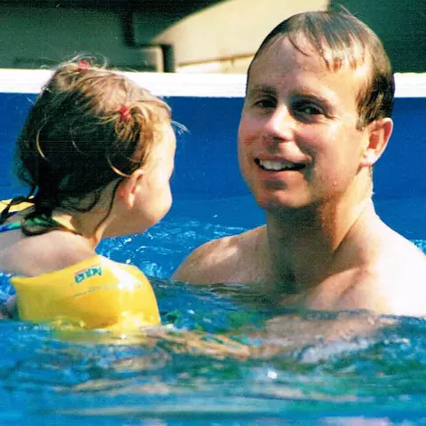 Abby Bosco swimming with her father