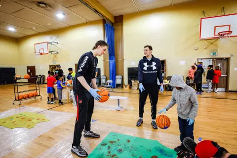 Center Caelum Swanton-Rodger (35) and Guard/Forward Noah Batchelor (11)
Maryland Men’s Basketball players create art with kids from Baltimore at Robert C. Marshall Recreation Center in Baltimore, MD on Saturday, May. 6, 2023.
Mackenzie Miles/Maryland Terrapins