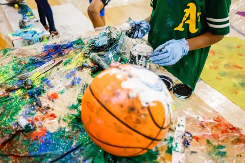 Maryland Men’s Basketball players create art with kids from Baltimore at Robert C. Marshall Recreation Center in Baltimore, MD on Saturday, May. 6, 2023.
Mackenzie Miles/Maryland Terrapins