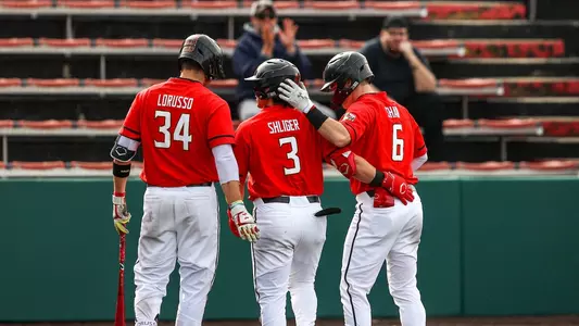 Shaw, Shliger, Lorusso at home plate