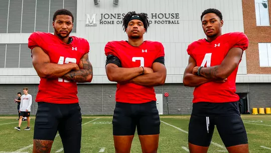 Dante Trader Jr., Beau Brade, and Tarheeb Still