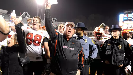 Will Yeatman and Ralph Friedgen celebrate after beating Virginia in Charlottesville in 2010