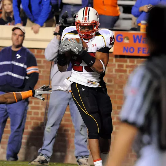 Da'Rel Scott scores on a TD pass from Danny O'Brien at Virginia in 2010