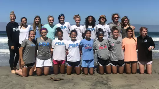 Meg Ryan Nemzer as the coach for PDA, which included Katie Coyle, Sydney Urban, and Lauren Wrigley