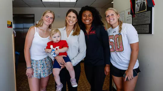 Lauren Karn with members of the Maryland softball team