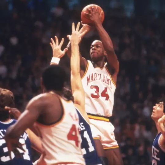 Len Bias shots over a Duke player in the 1984 ACC Championship game.