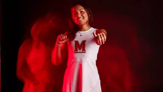 Minorka Miranda Red Background