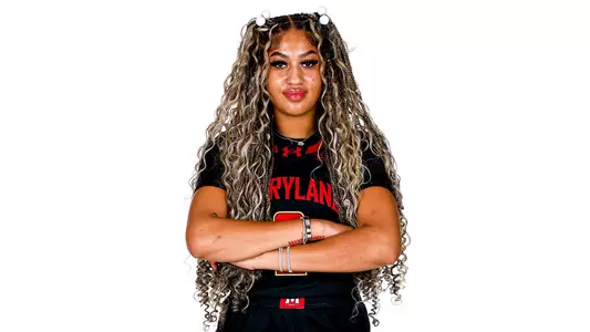 Kaylene Smikle black uniform posed