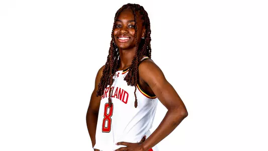 Kyndal Wallker posed white background